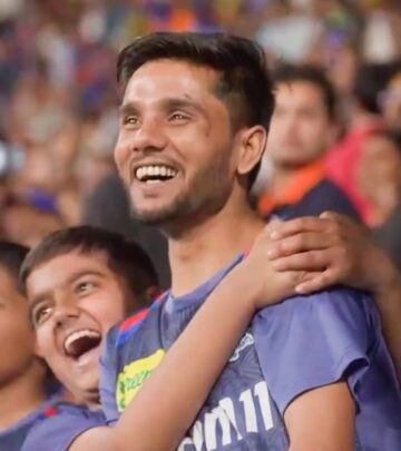 IPL franchise showcases adorable supporters in blue merchandise, winning hearts on social media.