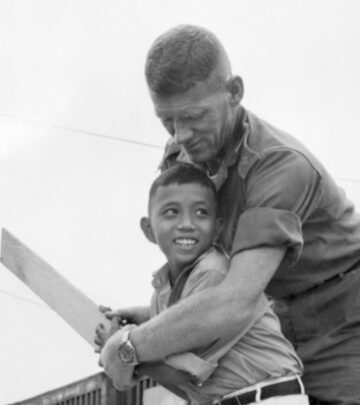 Historic cricket moment captures Australian soldier teaching orphaned Vietnamese boy during war