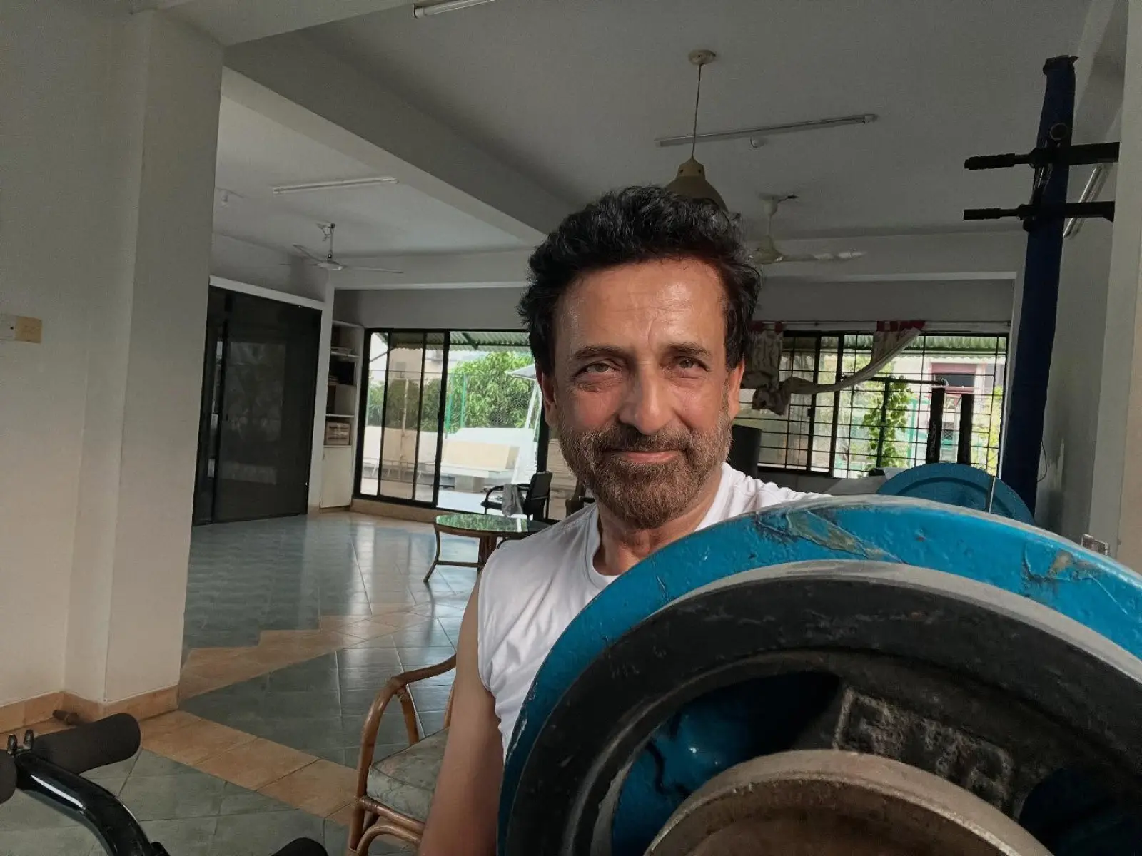 Athar Ali Khan hones his strength in a focused gym session—powering through discipline now.