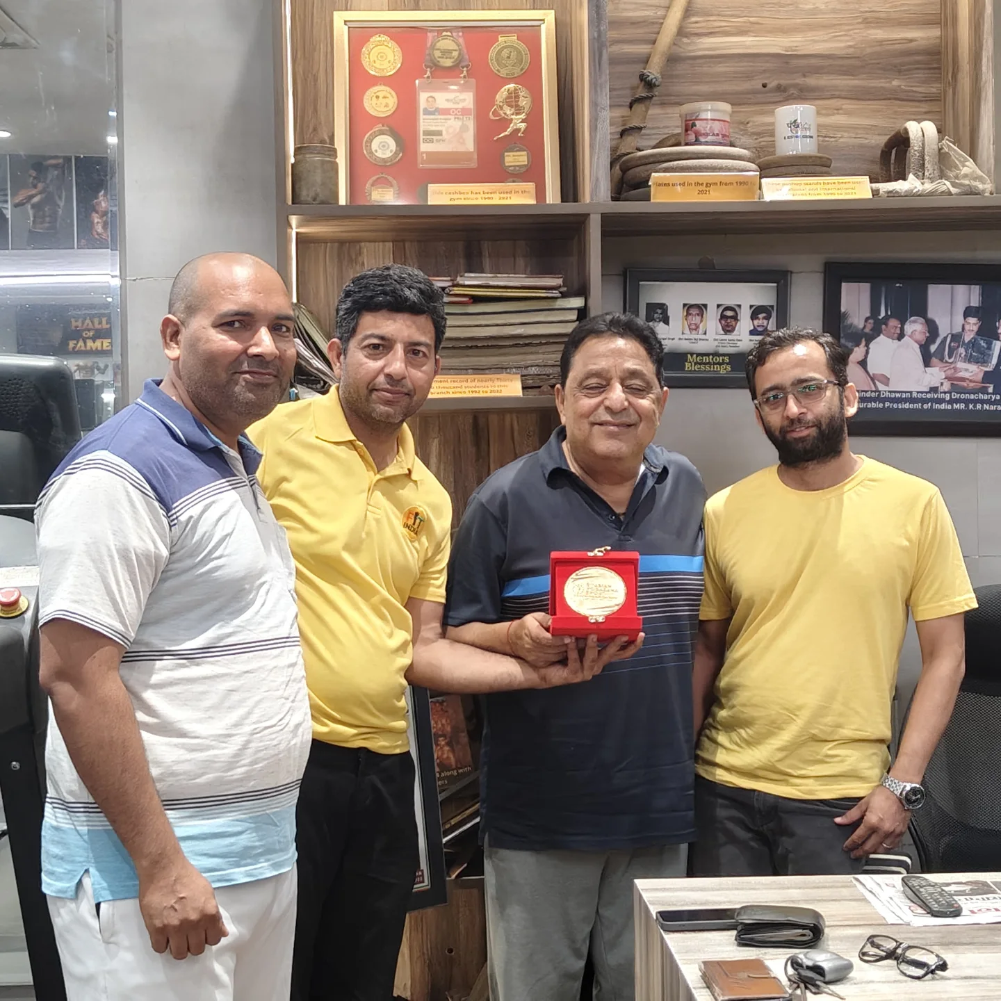 Bhupender Dhawan Honored At Yogasana Championship DYSA, Indraprastha officials and national leaders showcase a special memento with verve!!