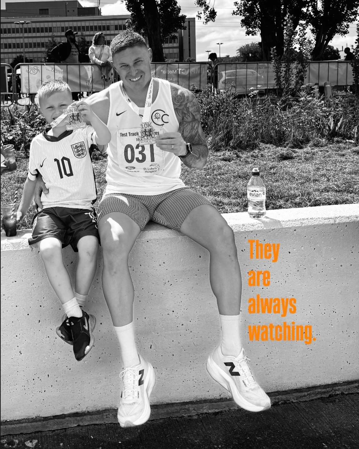 Celebrating a key race moment, a running dad marks his son's independent stride with pride.