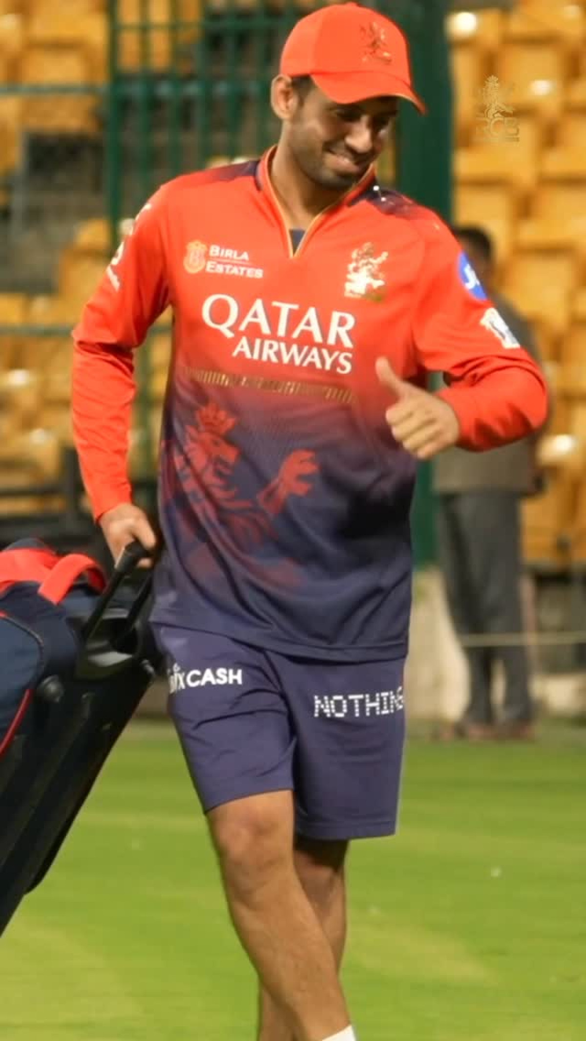 Jitesh Sharma Embraces RCB Passion Cricketer Jitesh Sharma cherishes vibrant moments with RCB in heartfelt celebratory style.