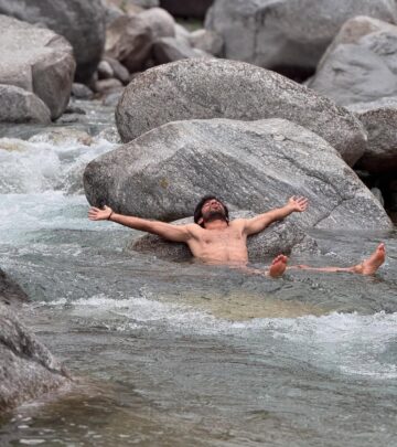 Cricketer Ravi Bishnoi takes a mindful pause, refreshing his energy before upcoming matches.