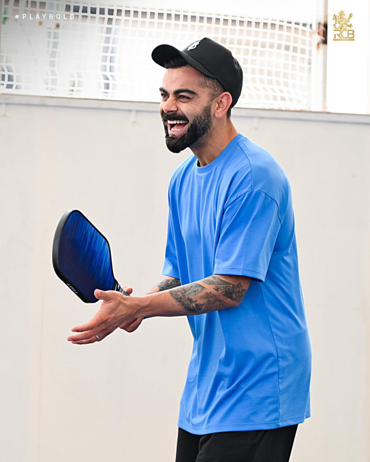 RCB Practice Turns Rainy Set Into Giggled Ball Fun Royal Challengers Bengaluru braved inclement weather with playful smashes and squad spirit.