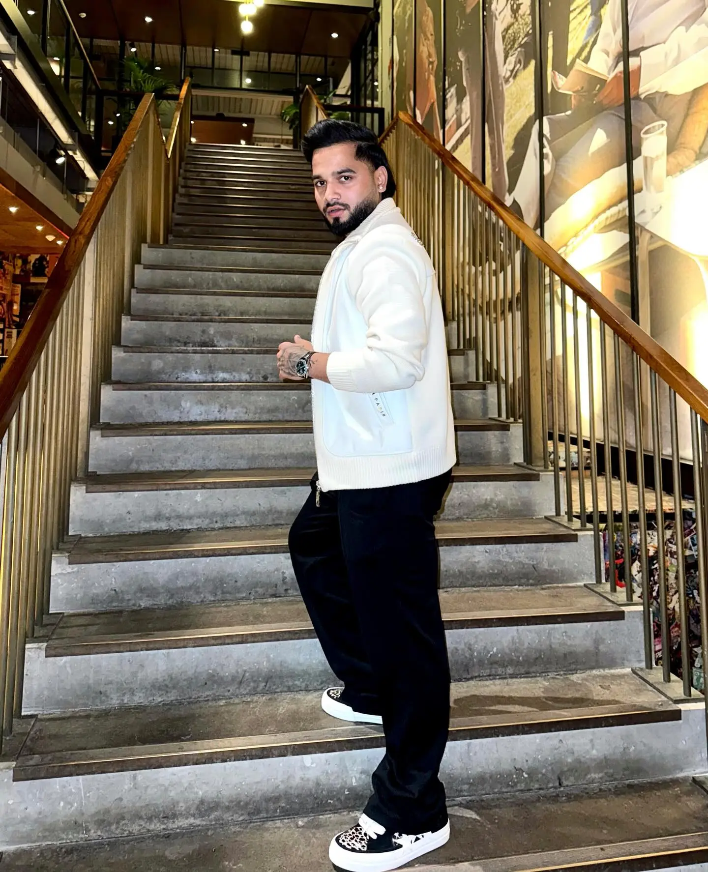 Suyash Sharma Celebrates In LA With Style Cricketer Suyash Sharma radiates charm in Los Angeles as he enjoys a vibrant LV night party!