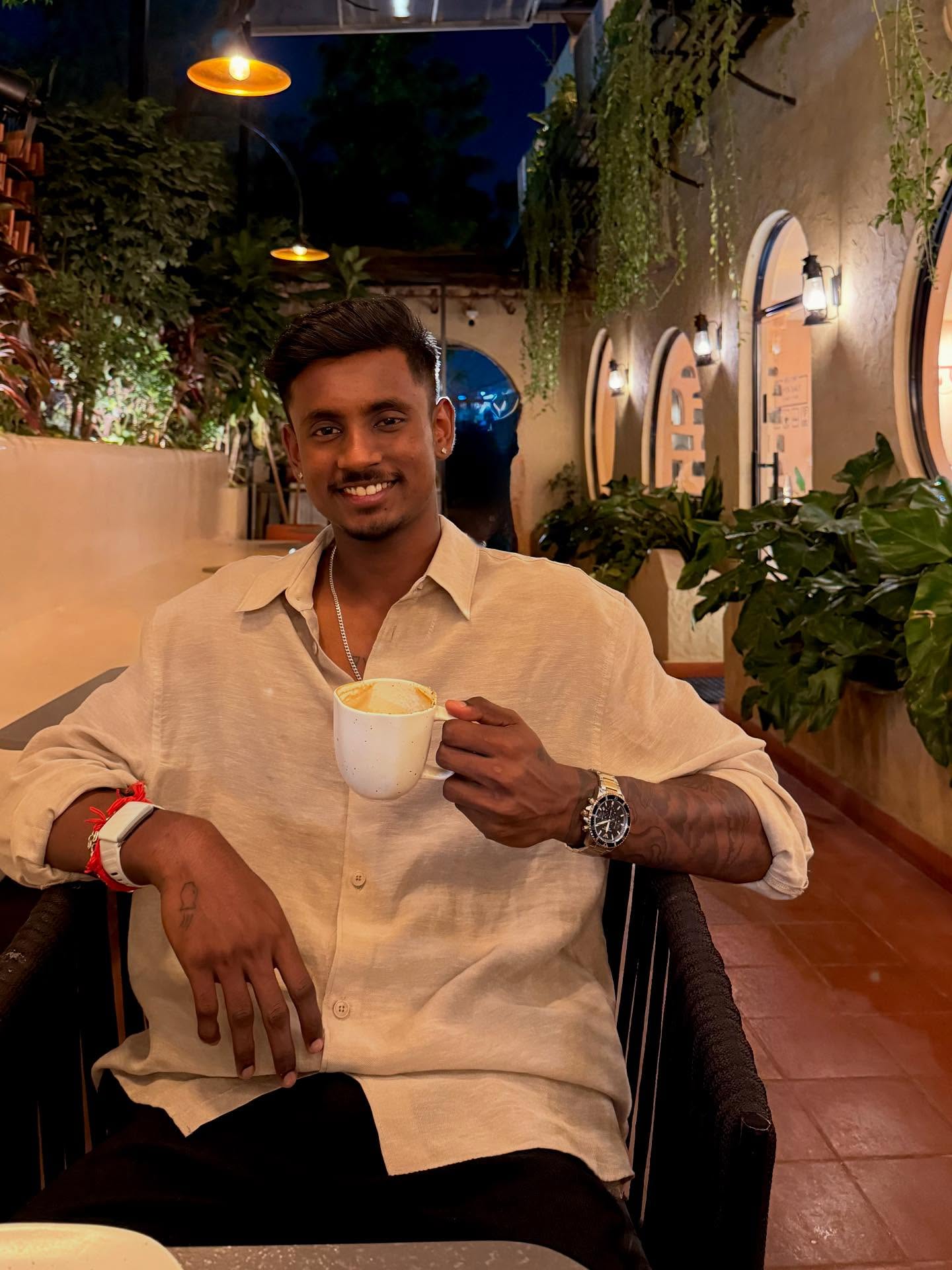 Abishek Porel Enjoys Tranquil Coffee Date Abishek relishes a quiet coffee break, mirroring his composed aura off the cricket field.!