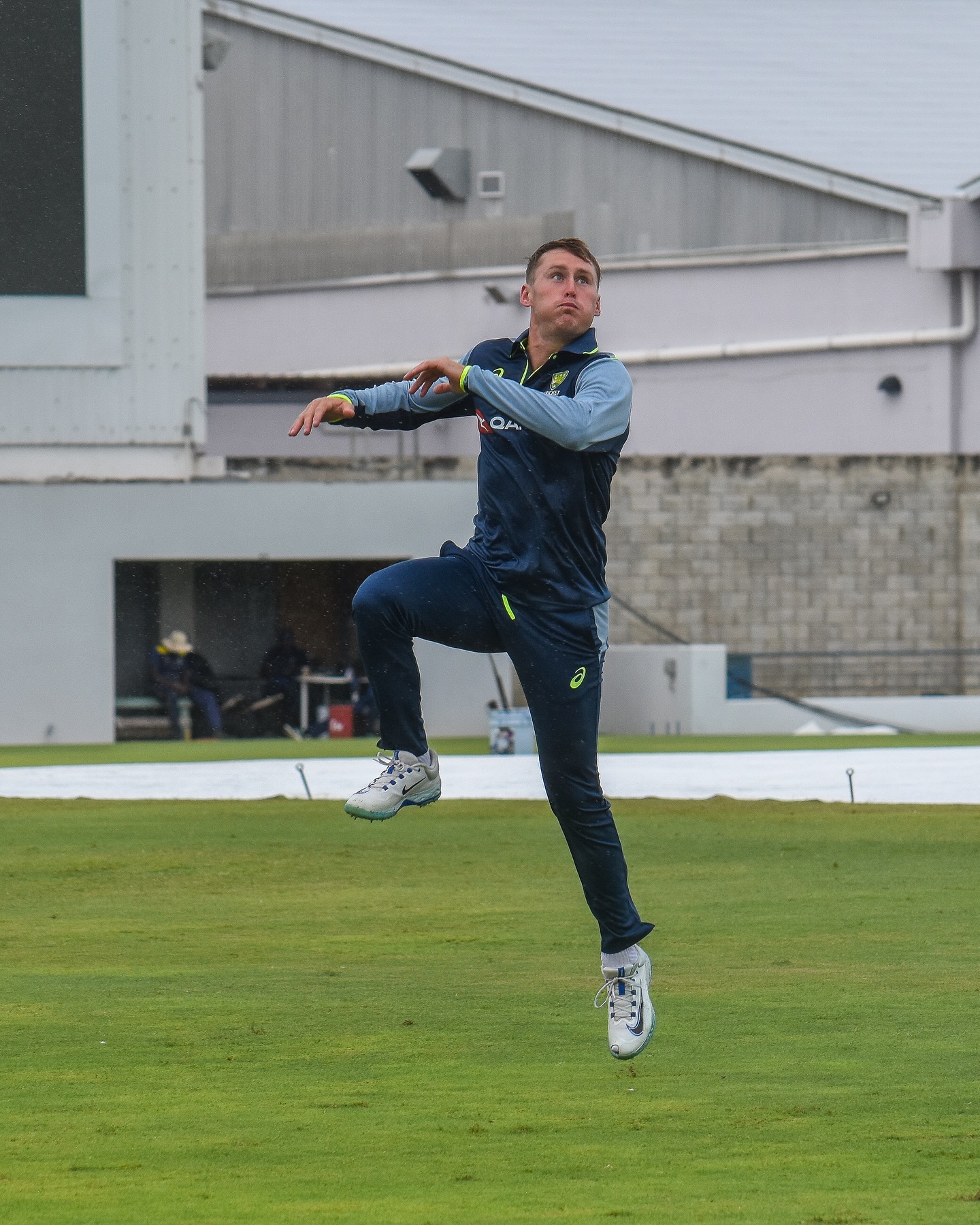 Aussie Cricketers Embrace Footy Fun Amid Rain Delay