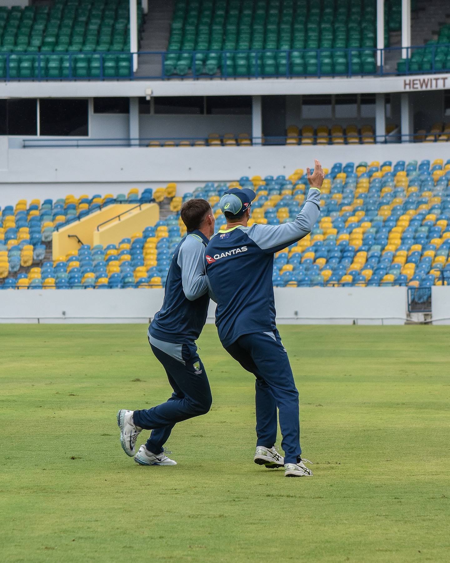 Aussie Cricketers Embrace Footy Fun Amid Rain Delay