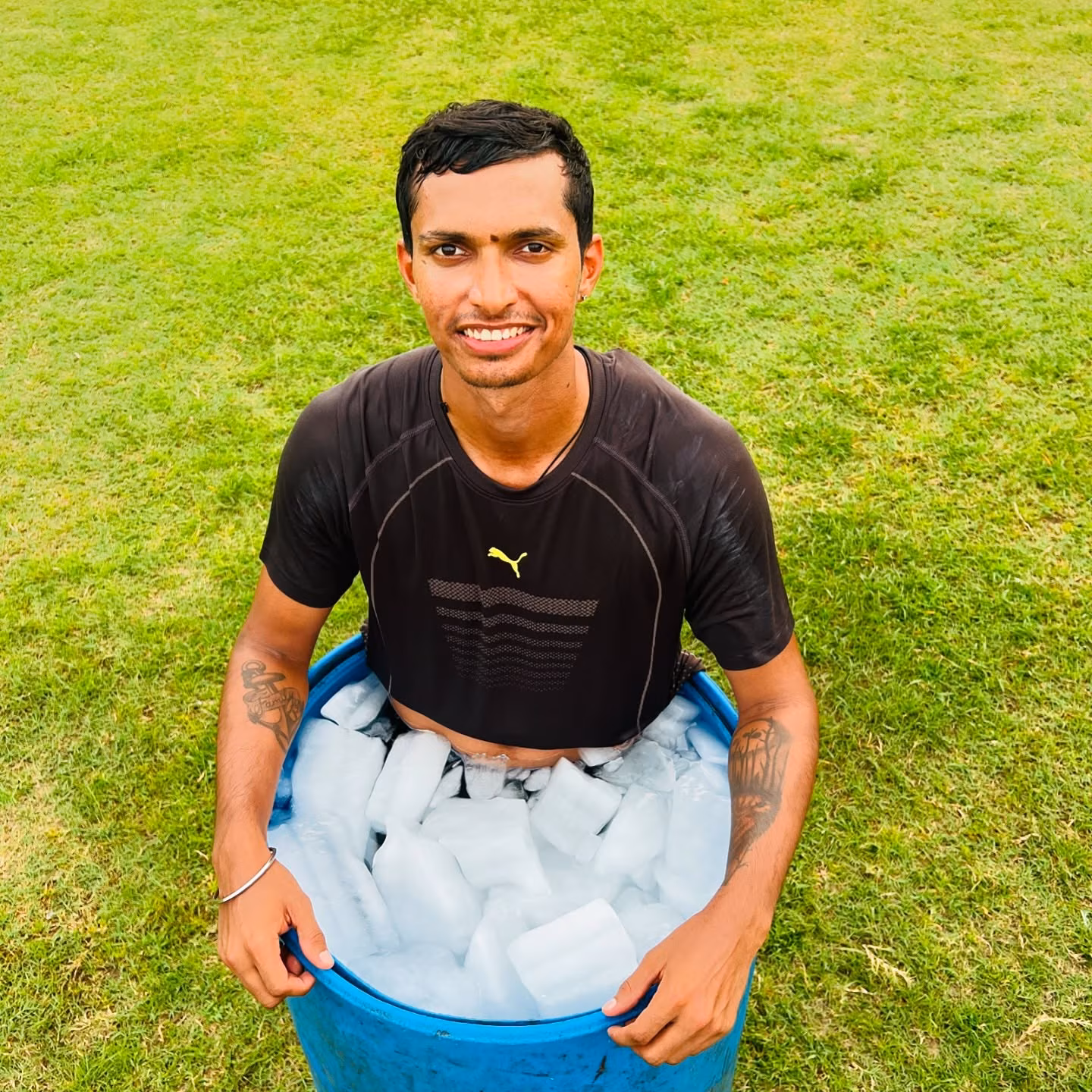 Navdeep Saini chills in style with ice barrel recovery, embracing downtime and refreshing!