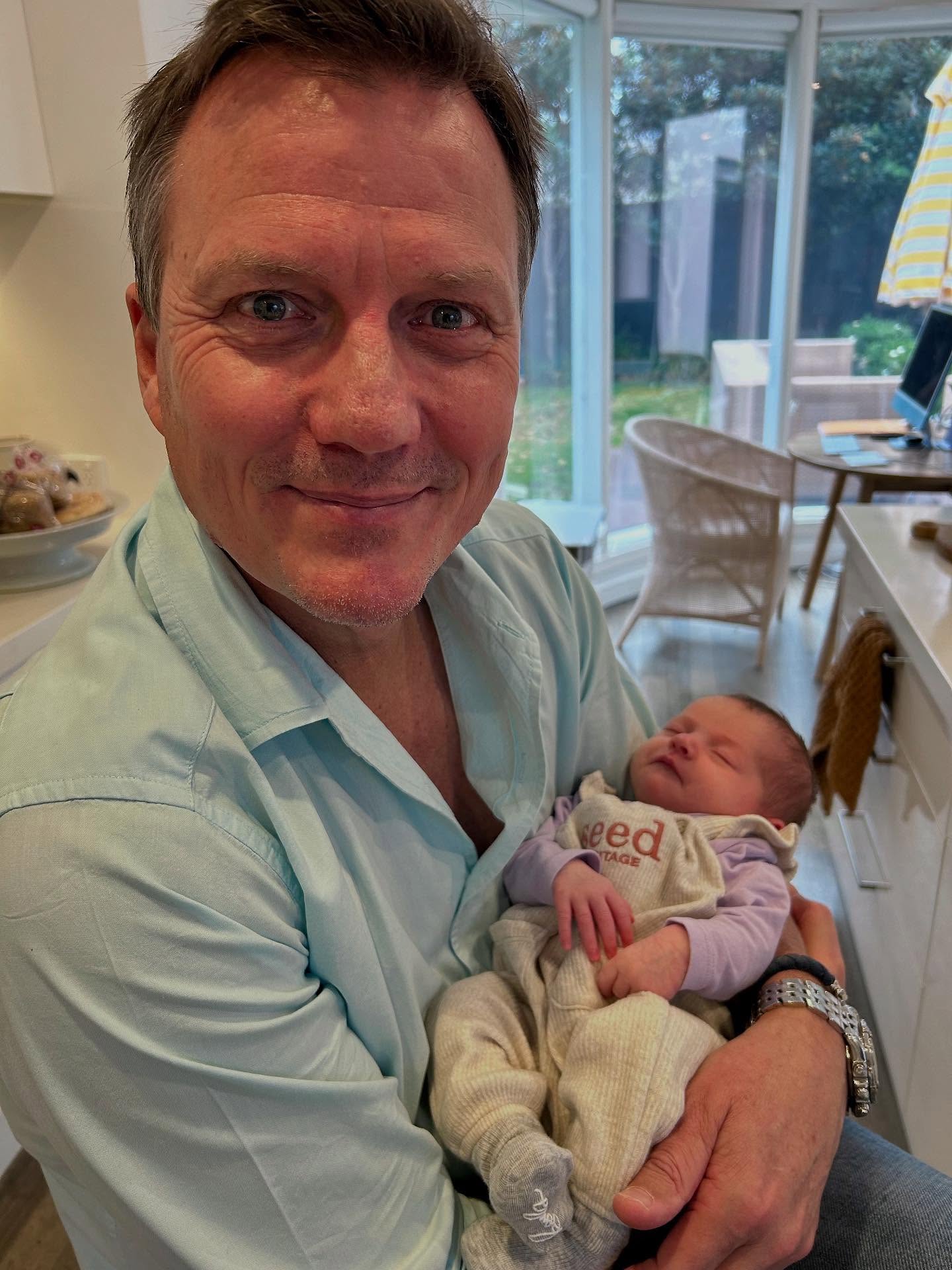Beloved sports pundit James Brayshaw enjoys a playful moment with his adored pet at dawn!