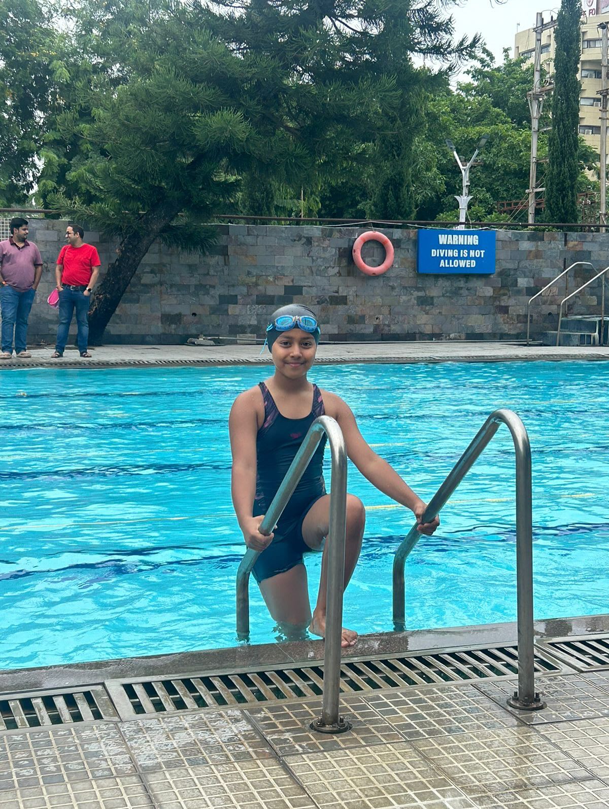 Ojha Daughter Triumphs in Swimming Competition