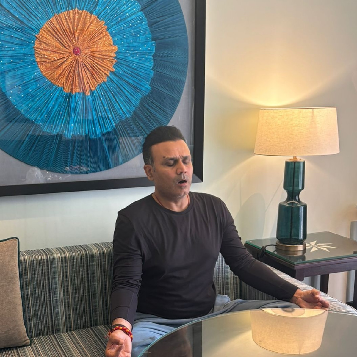 Sehwag Inspires Calm With Yoga Wisdom Cricket legend shares mindful quote, urging focus on breath and inner peace today for all.